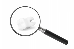 Tooth With Magnifying glass